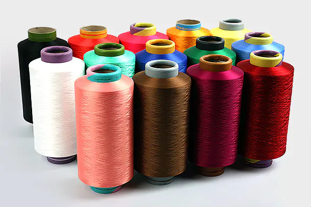 Anong Mga Salik ang Tinutukoy ang Grado ng Polyester Yarn DTY: AA vs. A Grade Quality Standards?